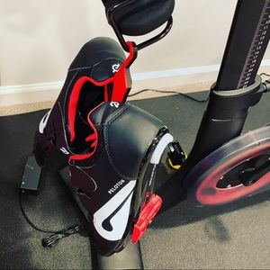 Shoe hanger for stationary bike